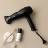 Hotel hairdryer with foldable grip